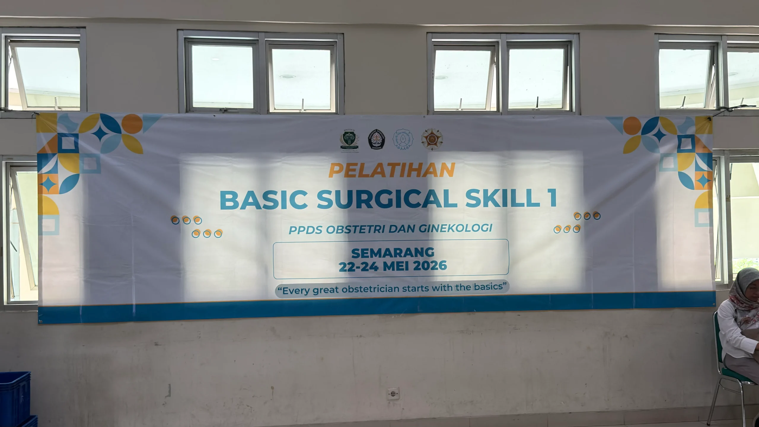 The banner of the Basic Surgical Skill (BSS) 1 Training for the Obstetrics and Gynecology Residency Program for the Joglosemar Region displayed at the event venue at The Faculty of Medicine Universitas Diponegoro (FK Undip), Semarang, Friday, May 22, 2026.