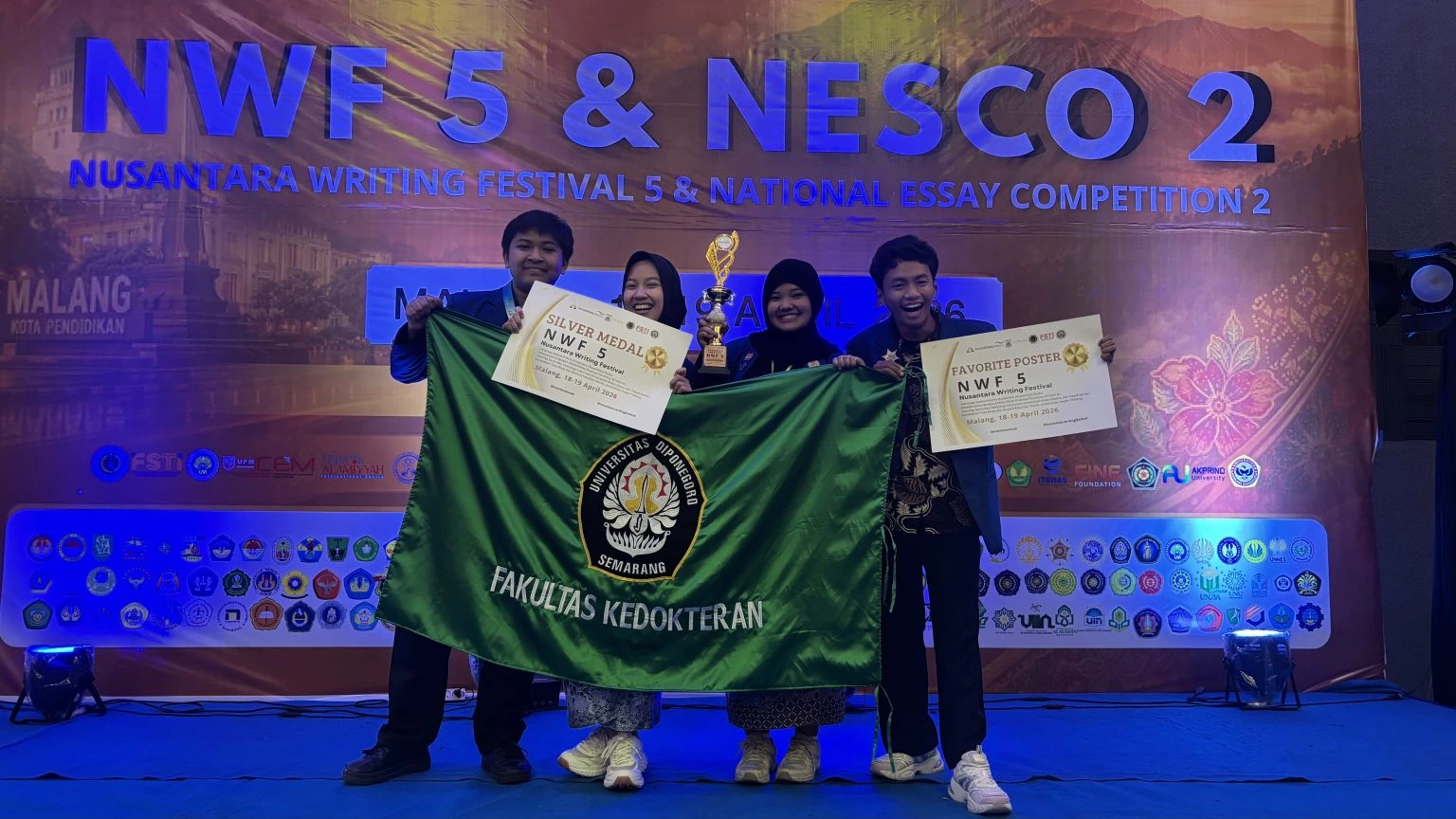Students from the Faculty of Medicine, Universitas Diponegoro won a Silver Medal and Favorite Poster Award at Nusantara Writing Festival 2026 through their SAWIT innovation, which utilizes MBG waste to enhance road safety.